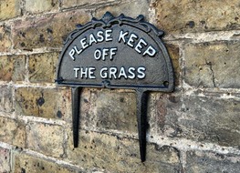 Keep off the grass plaque